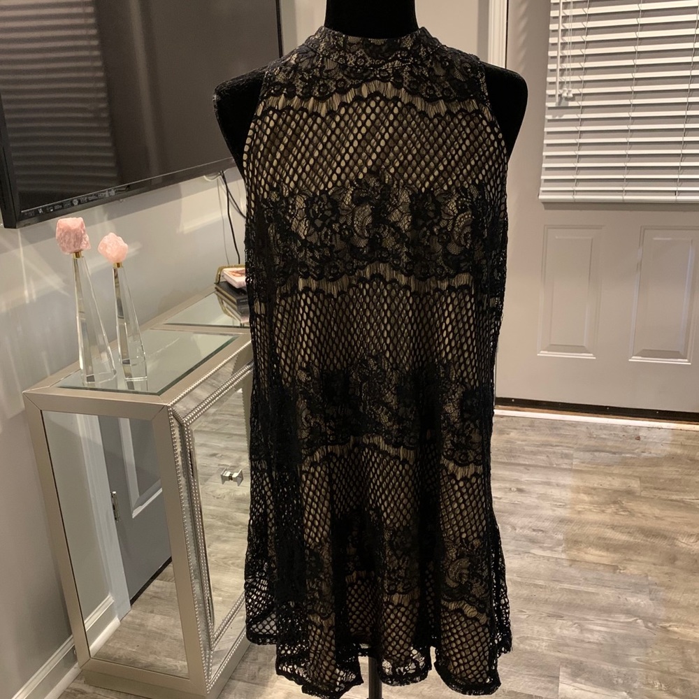 Black lace over nude dress